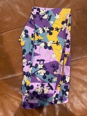 LuLaRoe Purple Yellow Blue Cartoon Print Leggings